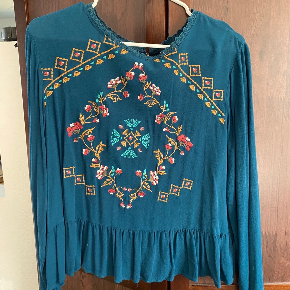 blue patterned embroidered shirt